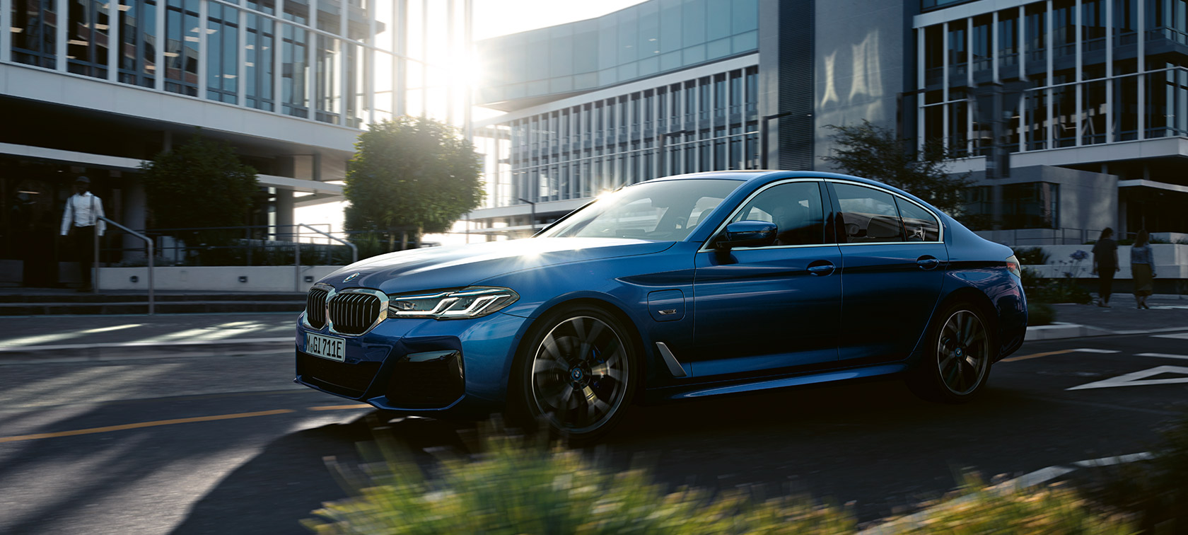 BMW 5 Series Sedan G30 Facelift 2020 Phytonic Blue three-quarter front view driving
