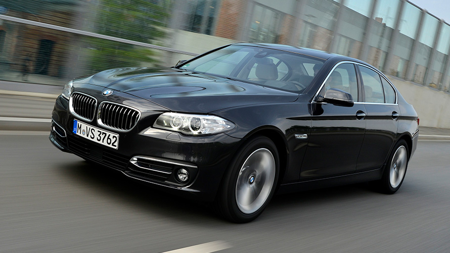 BMW 518d Sedan (F10 LCI) three-quarter side view driving BMW 518d Sedan (F10 LCI) three-quarter side view driving