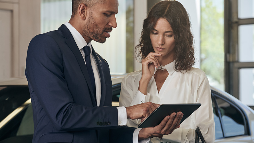 Women being advised by BMW employee