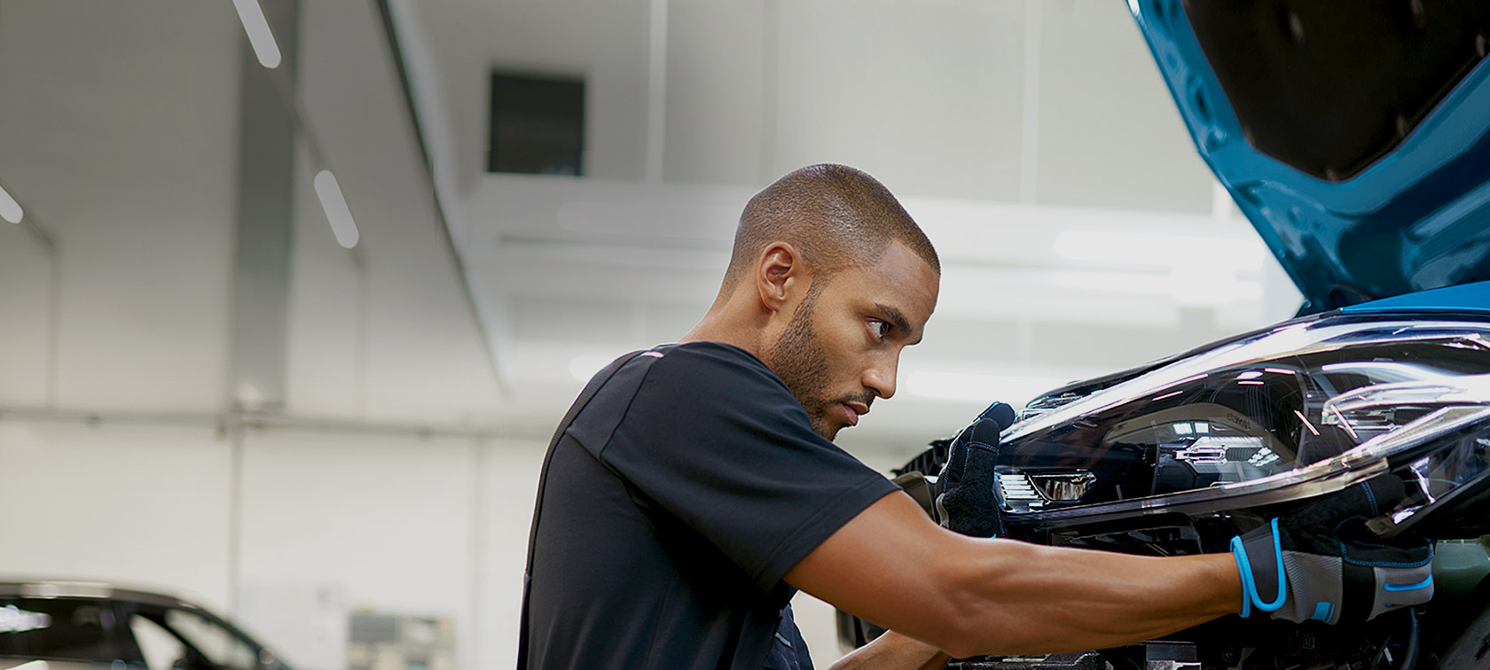 BMW Repair and Care BMW Repair and Care employee service workshop