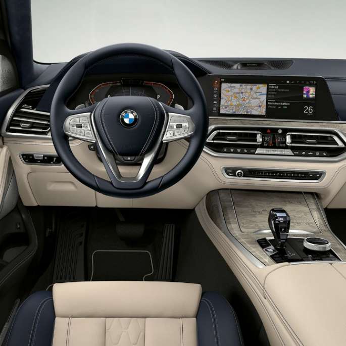 Frontal close-up of the driver's cockpit of the BMW X7 SUV G07 with Design Pure Excellence features